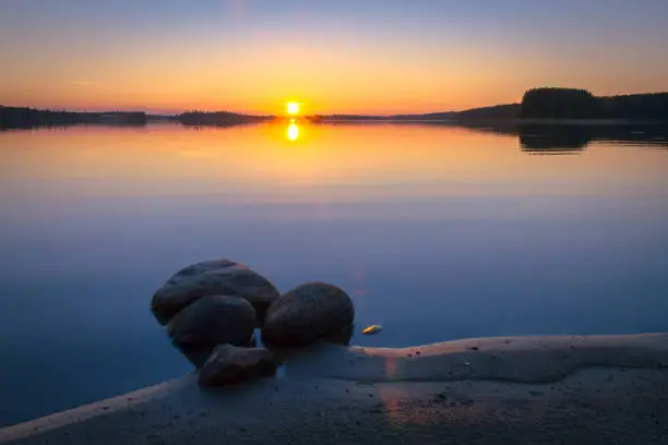 Photo of Summer midnight sunset from Kuhmo, Finland.