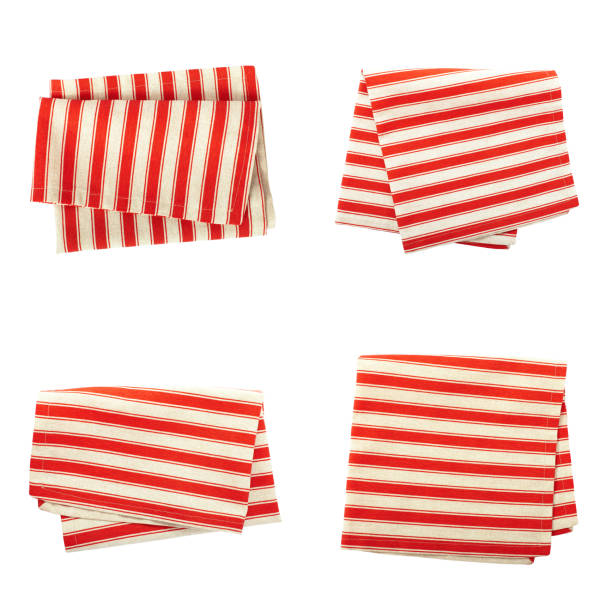 istock Set stack of colorful dish towels isolated on white. Multi-colored linen napkins for restaurant. Flat mock up for design. Top view 942934622