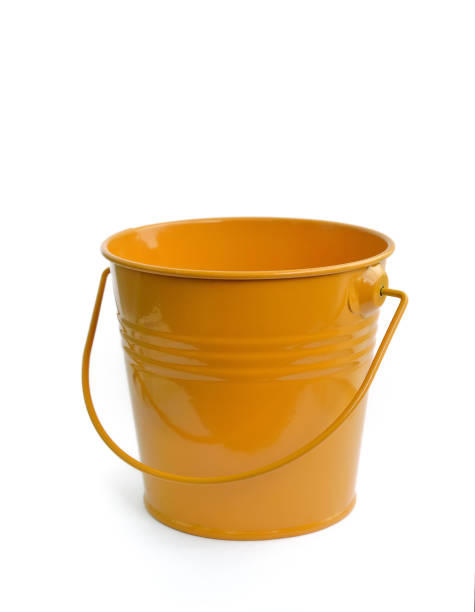 istock Yellow steel bucket isolated on white background 942935324