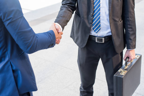 istock business handshake and teamwork for achievement KPI and success goal 942938974