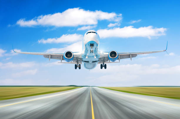 istock Airplane aircraft with split-scimitar wing flying departure landing speed motion on a runway in the good weather with cumulus clouds sky day. 942941922