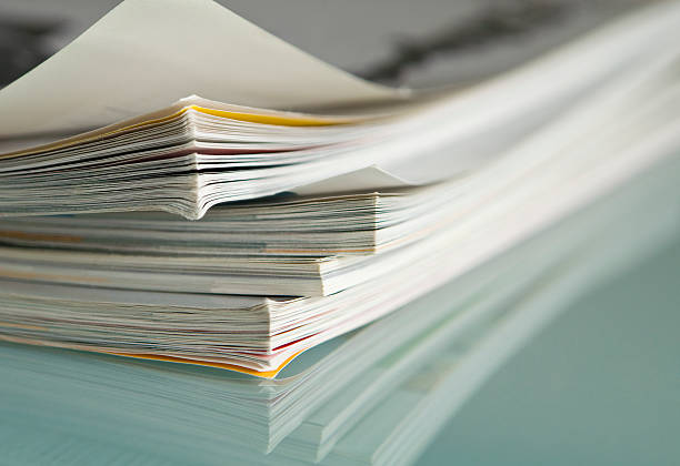 istock Close up of corner of stack of magazines 94295105