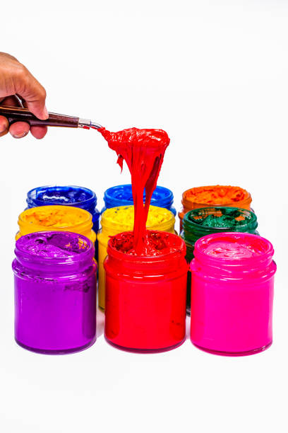 istock Use trowel scoop red color from the can. 942967018