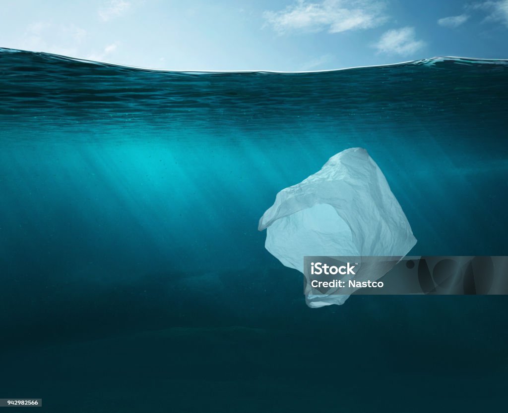 Water pollution concept Plastic bag in the ocean with copy space Sea Stock Photo