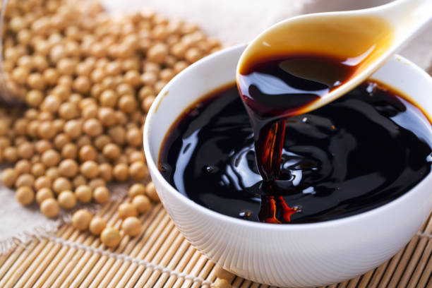 istock Soy sauce poured from a spoon 942985422