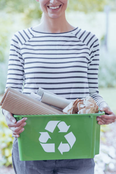 istock Woman holding box with paper 942994028