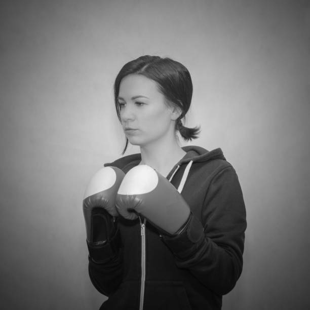 istock Boxing gloves athletic slim girl 943008160