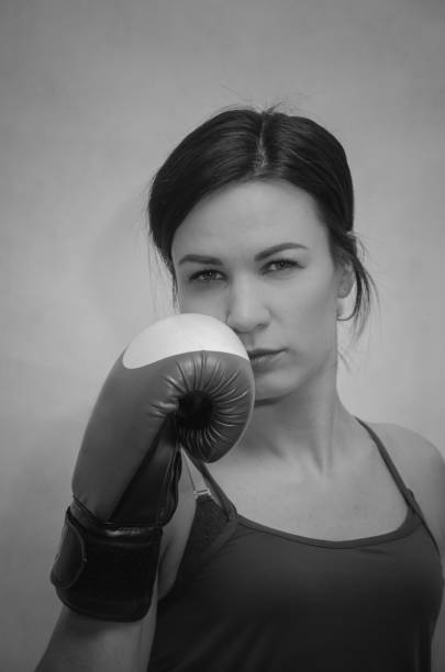 istock Boxing gloves athletic slim girl 943008208