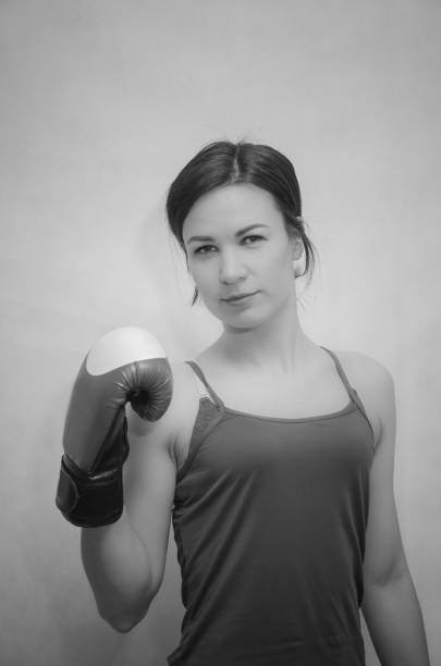 istock Boxing gloves athletic slim girl 943008252