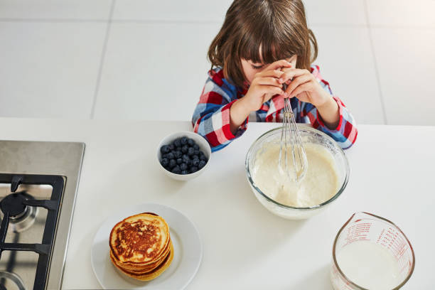 istock This is the way we mix the batter 943009030