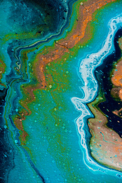 istock abstract blue background with oil paint 943012534