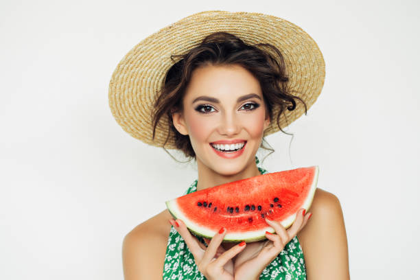 istock Woman with water melon 943015298