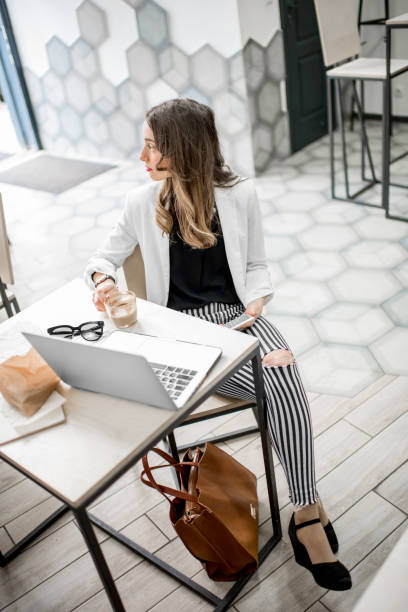 istock Business woman in the cafe 943015364