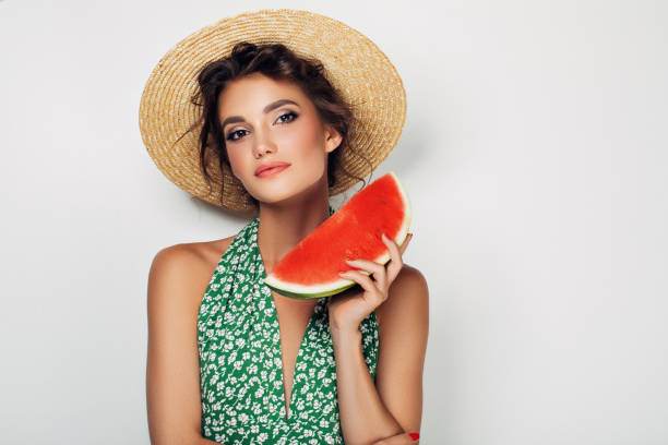 istock Woman with water melon 943018436