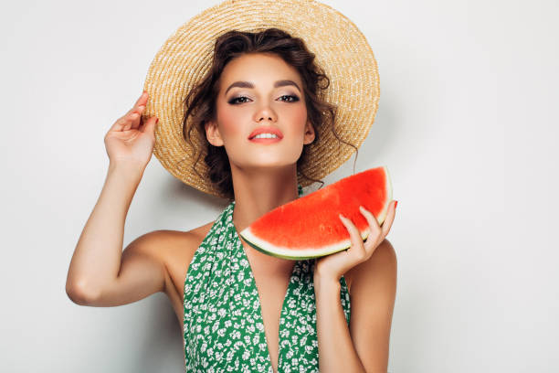 istock Woman with water melon 943018514