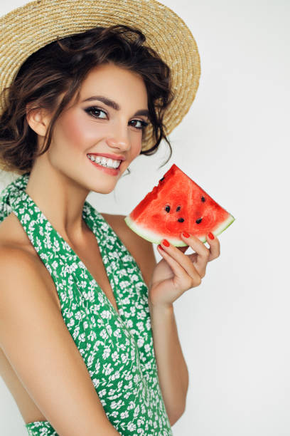 istock Woman with water melon 943018568