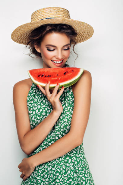 istock Woman with water melon 943018634