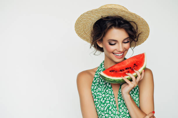 istock Woman with water melon 943018712