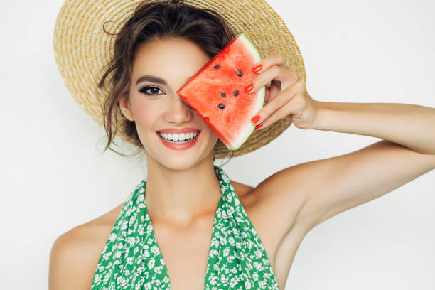 istock Woman with water melon 943018722