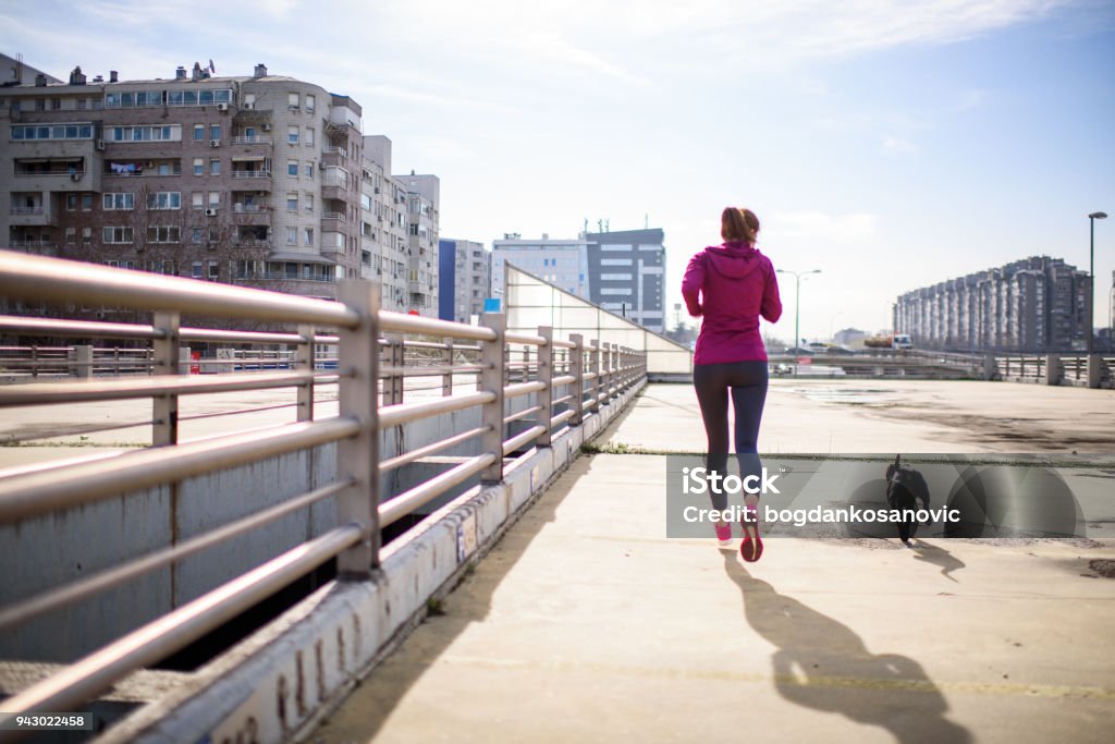 Mujer atleta - Foto de stock de Perro libre de derechos