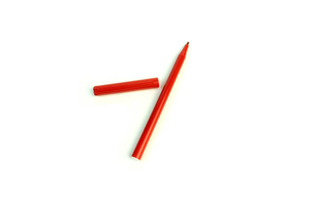 istock the red marker. photo on white background. 943022820