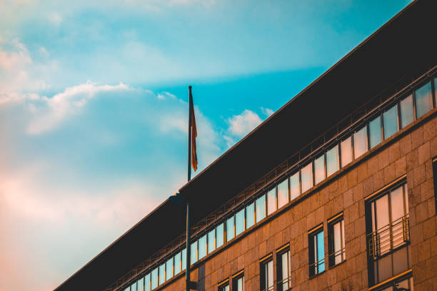 istock office building with germany flag 943026884