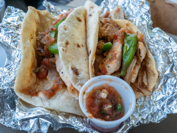istock Two Chicken Fajita Soft Tacos on Foil 943029612