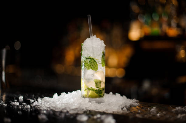 istock alcoholic cocktail mojito in a crystal glass 943033748