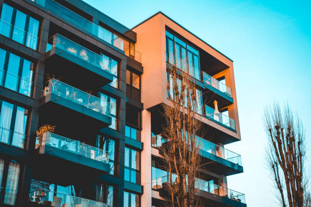istock futuristic square building for real estate with glass balcony 943034596