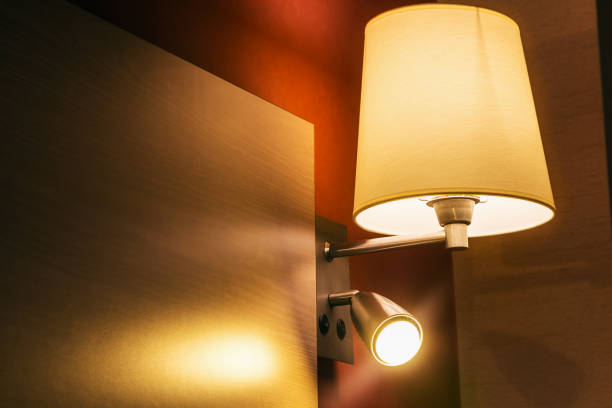 istock sconce over the bed in the room or hotel room 943034936