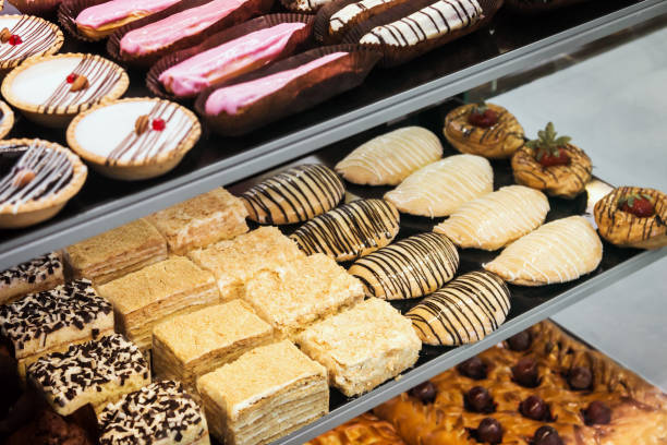 istock cakes and sweets on the counter of a candy store 943037968