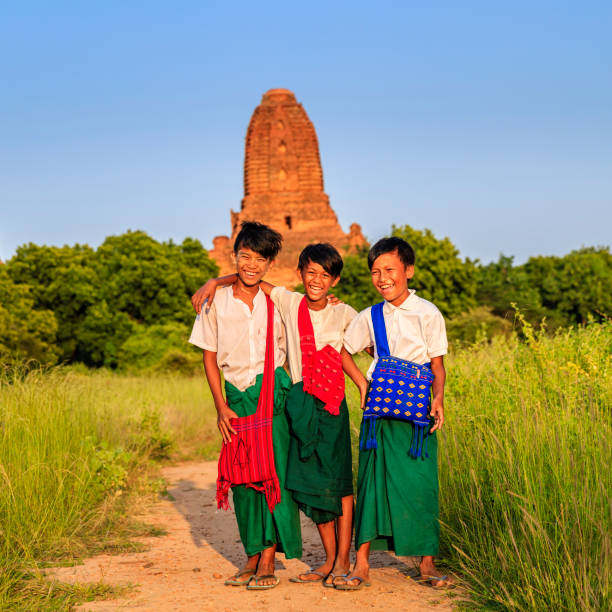 istock Young Burmese schoolboys walking in Bagan, Myanmar 943038946