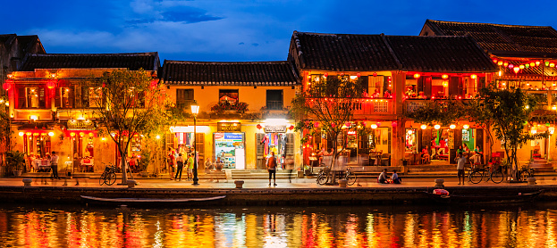 Evening view of Old Town in Hoi An city, Vietnam. Hoi An is situated on the east coast of Vietnam. Its old town is a UNESCO World Heritage Site because of its historical buildings.
