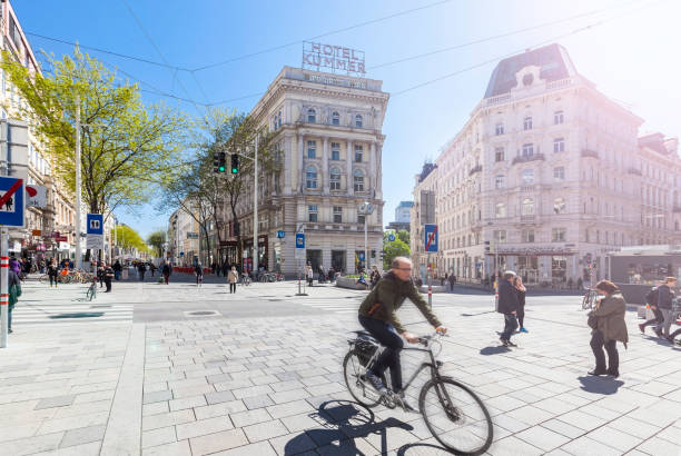 Vienna, Austria - April 29,2016: Some people shopping on the new traffic-calmed area with precedence for pedestrians Mariahilfer Strasse Vienna. It is the largest and one of the most famous shopping streets of Austria.