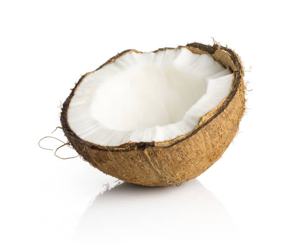 istock Fresh brown coconut isolated on white 943050670