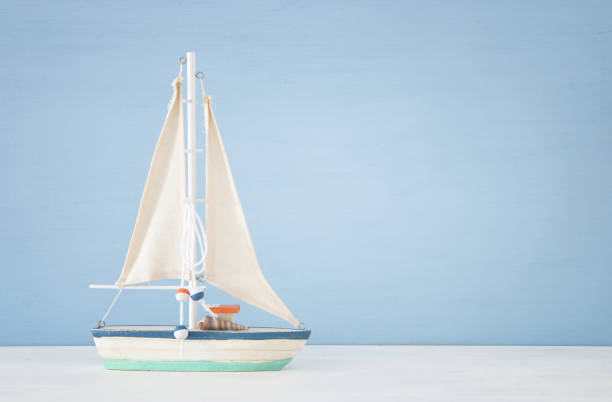 istock nautical concept with sail boat over blue background. 943050892