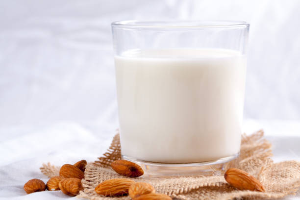istock Single glass of almond milk. 943055072