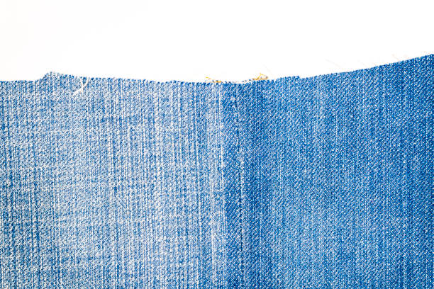 istock Piece of light blue jeans fabric 943062506