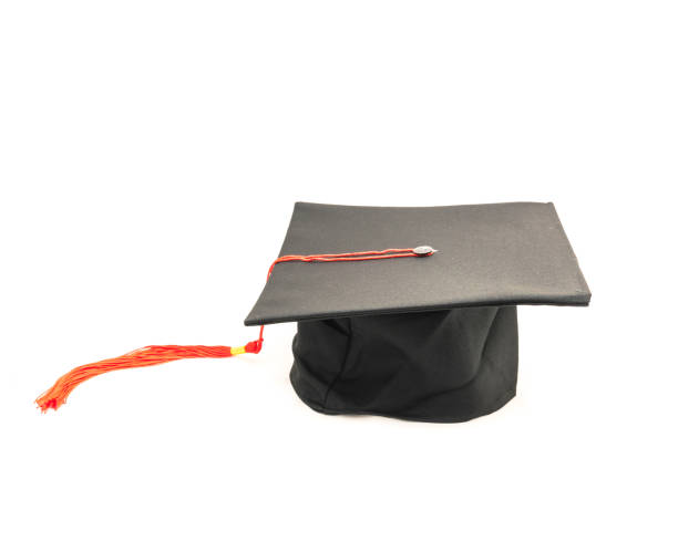 istock Studio shot of black graduation cap isolated on white background 943062708