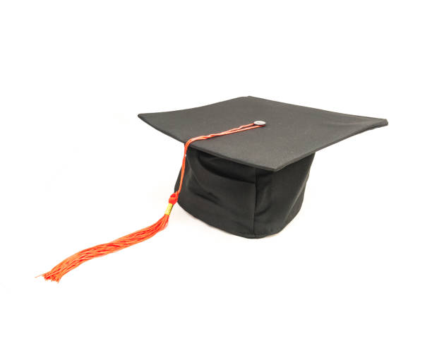 istock Studio shot of black graduation cap isolated on white background 943062778
