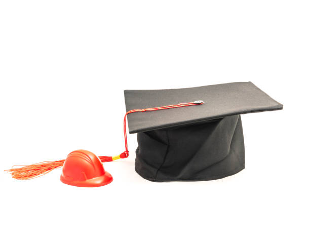 istock Studio shot of black graduation cap isolated on white background 943062960