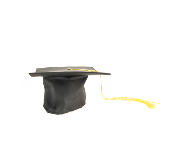 istock Studio shot of black graduation cap isolated on white background 943063106