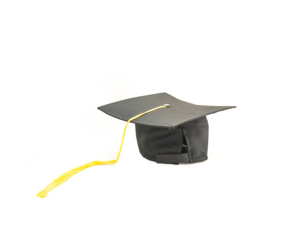 istock Studio shot of black graduation cap isolated on white background 943063260