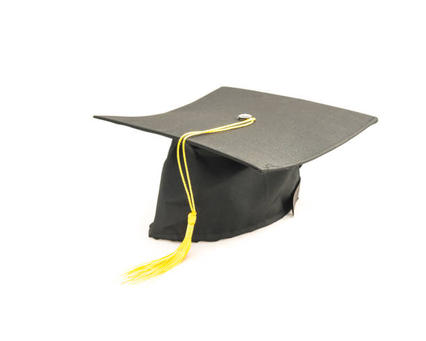 istock Studio shot of black graduation cap isolated on white background 943065408