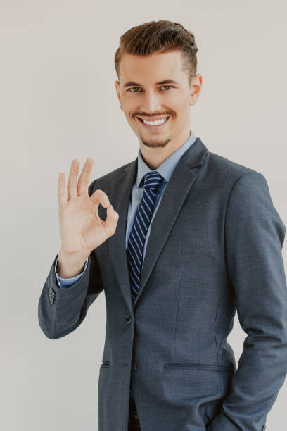 istock Successful Elegant Business Man Showing OK Sign 943070006