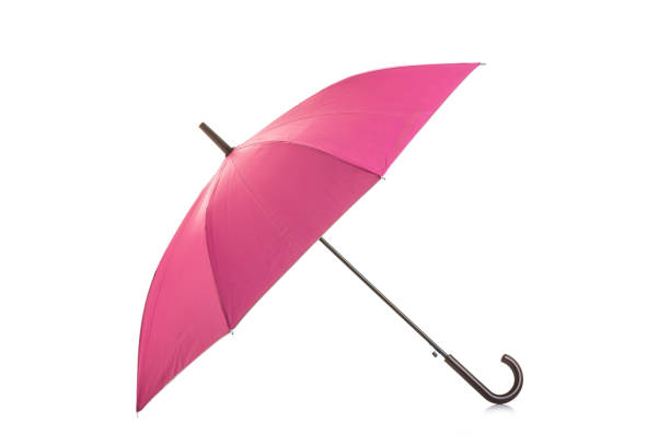 istock Pink umbrella isolated on white 943070368