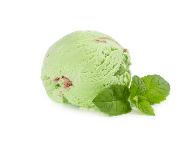 istock Mint-raspberry ice cream ball with fresh mint isolated on white 943080444