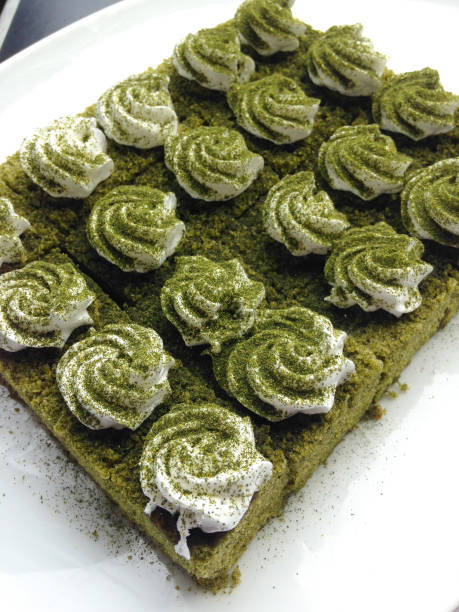 istock Matcha green tea cake in dessert buffet 943081716