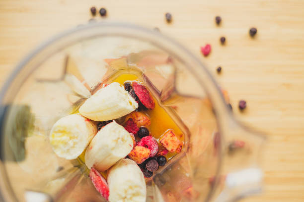 istock Smoothie with berries, orange juice and banana 943095166