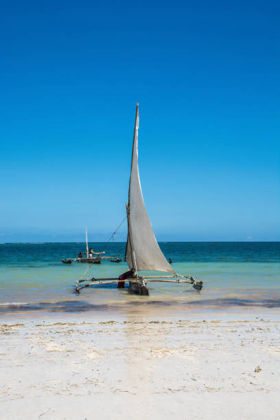 istock Sailboat at the diani beach in Kenya. Beautiful view on ocean. 943095518
